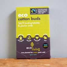 Load image into Gallery viewer, Box of eco cotton buds with a yellow and purple design on a wooden surface.