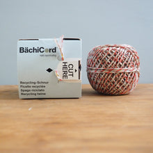 Load image into Gallery viewer, Box of BächiCord with a ball of string on a wooden surface

