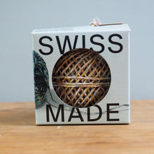 Load image into Gallery viewer, Small box with 'Swiss Made' text and a woven pattern on a wooden surface.
