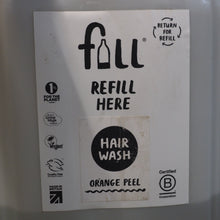 Load image into Gallery viewer, Refillable container with 'full' brand label for hair wash with orange peel scent.
