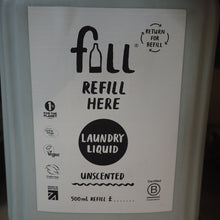 Load image into Gallery viewer, Bottle of laundry liquid with a refill label on a dark background
