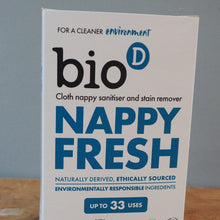 Load image into Gallery viewer, A box of bioD Nappy Fresh cloth nappy sanitiser and stain remover standing on a wooden tabletop against a gray wall.
