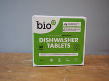 Load image into Gallery viewer, A box of bioD Dishwasher Tablets standing upright on a wooden surface against a plain gray wall.
