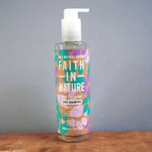 Load image into Gallery viewer, Bottle of Faith in Nature dog shampoo on a wooden surface with a gray background
